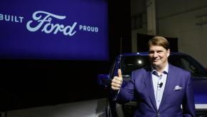 Ford CEO Jim Farley speaking at an event.