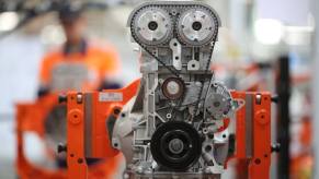 A Ford Duratec engine fitted with a timing belt amidst production in a plant in Elabuga, Russia