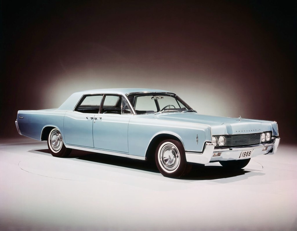 A powder-blue Lincoln Continental shows off its gangster car proportions and light paintwork.