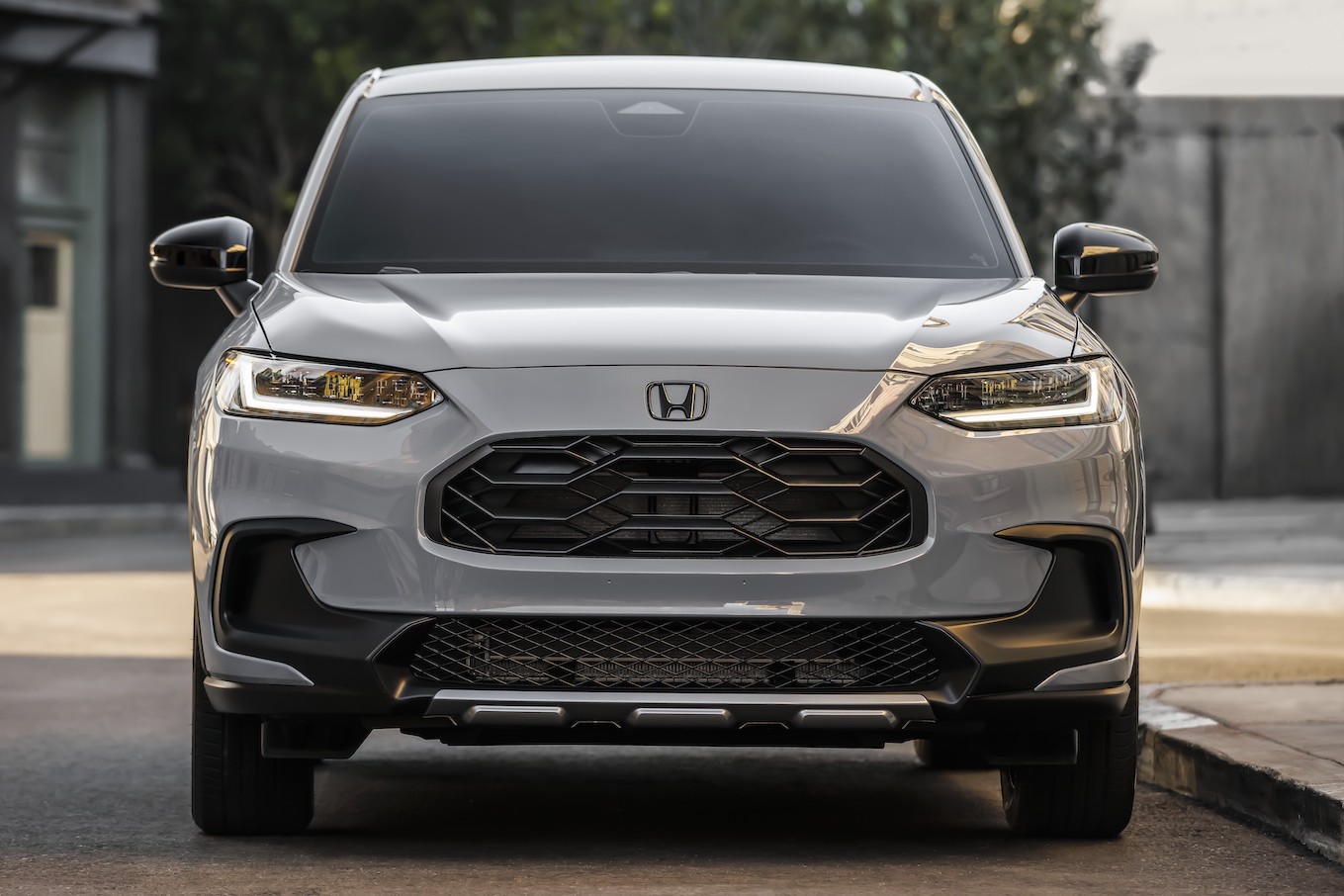 A silver 2024 Honda HR-V parked on the street. Honda HR-V sales are stagnating.