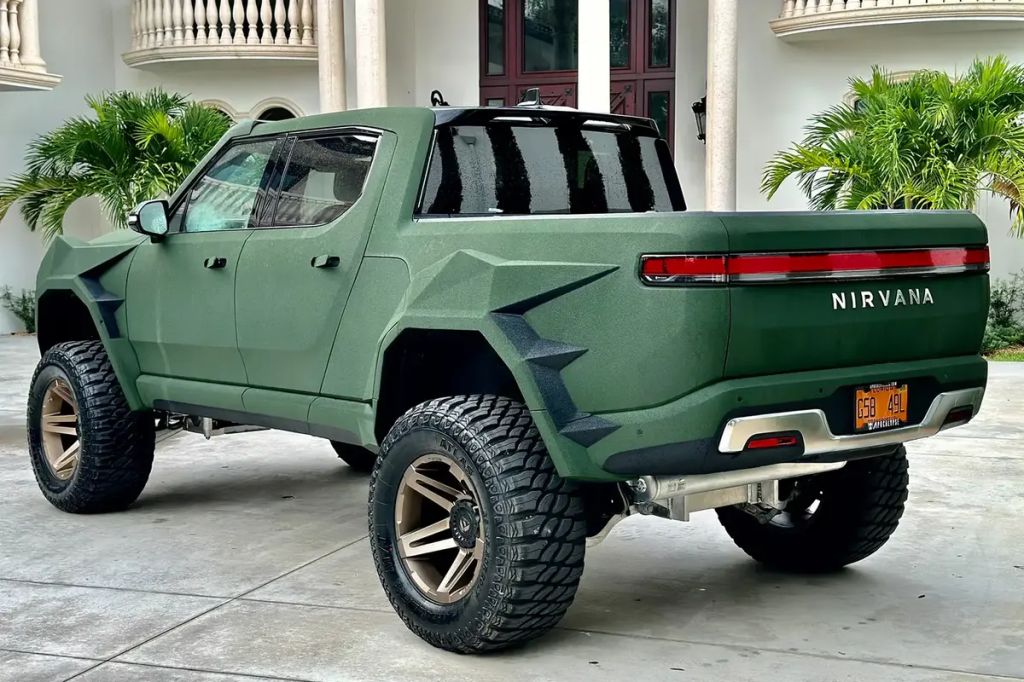 2023 Apocalypse Rivian R1T EV in front of house