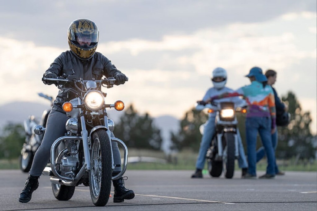 A student rider prepares to practice in motorcycle classes.
