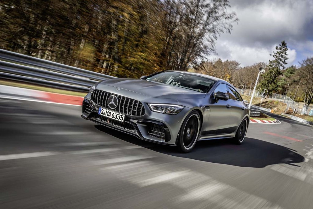 2023 Meceredes-AMG GT Coupe front 3/4 driving on nurburgring racetrack in Germany. One of the cheapest supercars one can buy new in 2023