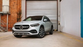A white Mercedes-Benz GLA-Class subcompact SUV is parked.