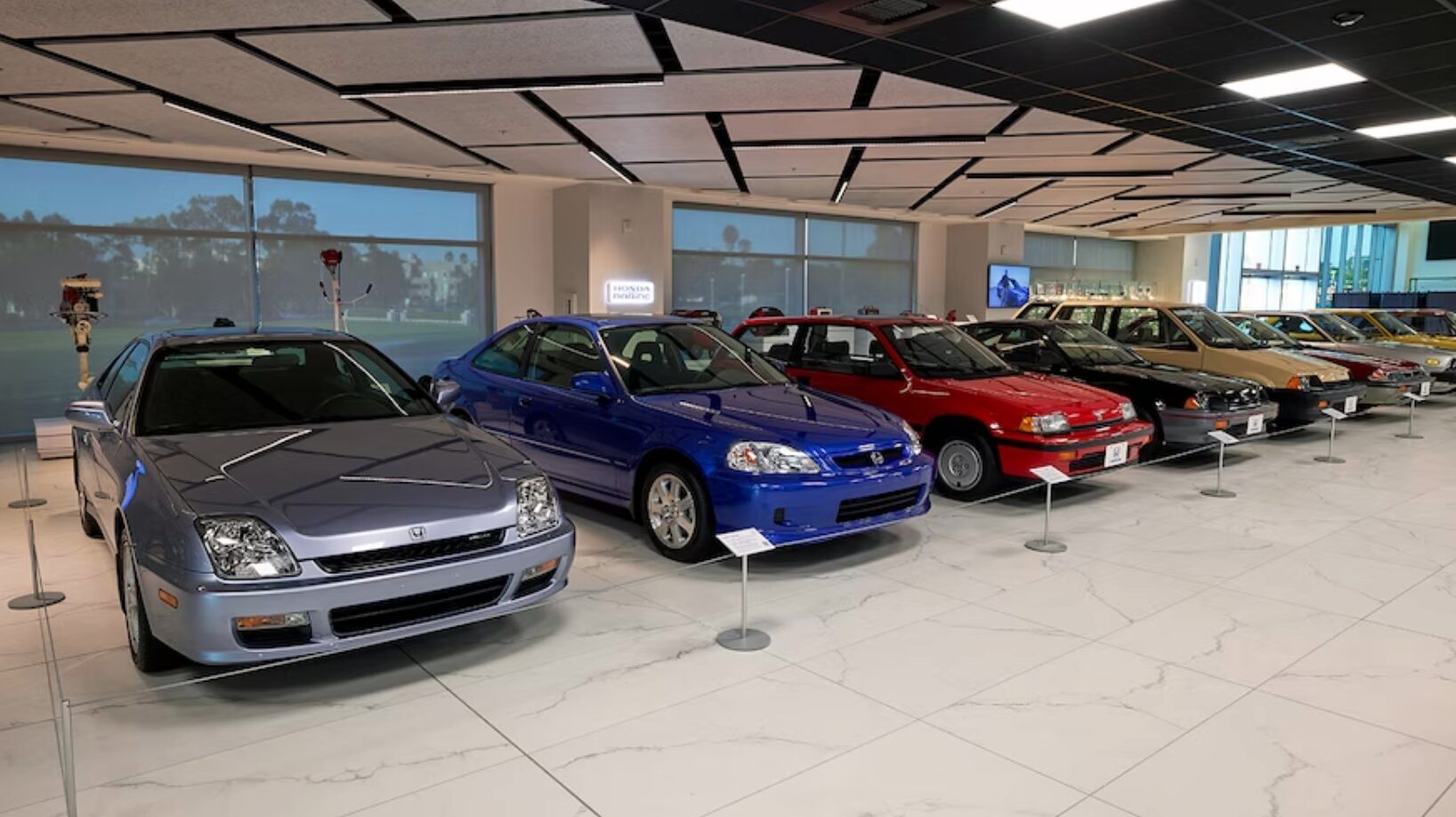 A row of Honda sedans in the new museum