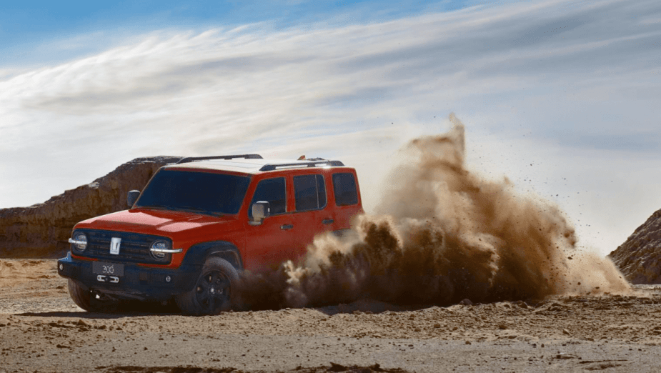 Orange 2023 Great Wall Tank 300 midsize SUV front 3/4 view