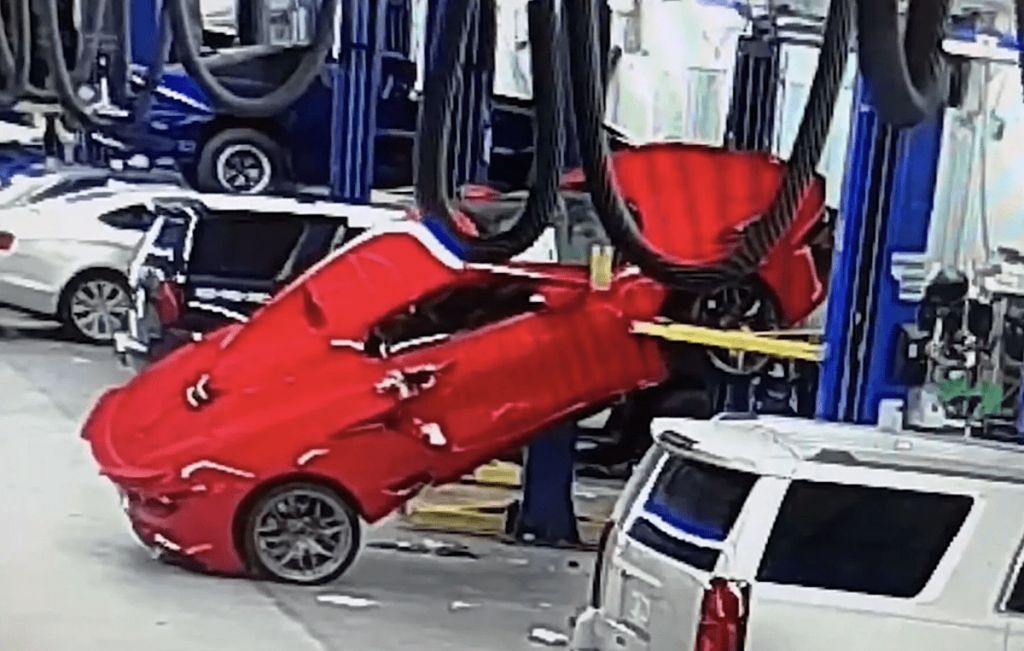 Red 2023 Chevrolet Corvette on lift