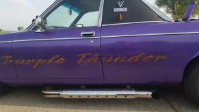 Close up on the "Purple Thunder" decal on the side of the Daimler Double-Six.