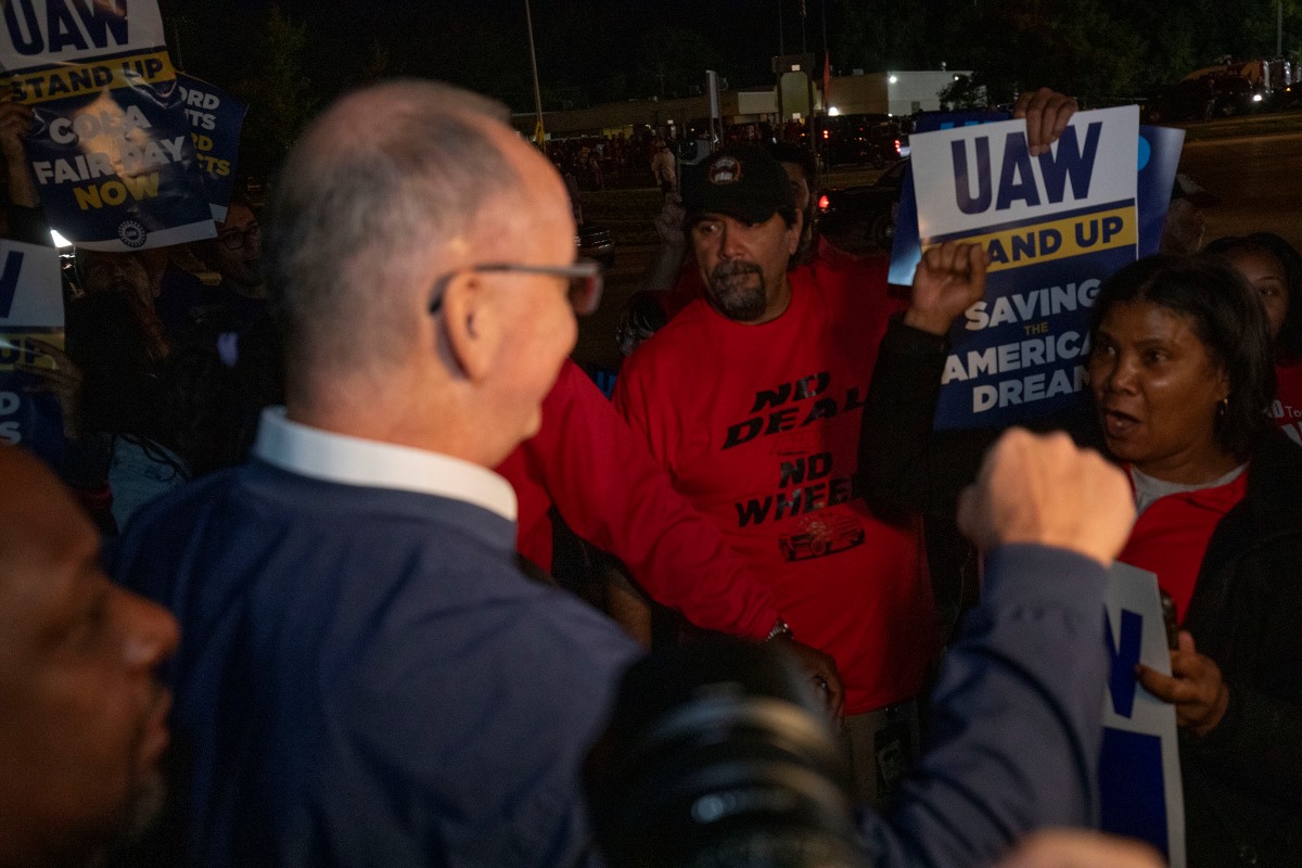 UAW President Shawn Fain with UAW workers on strike