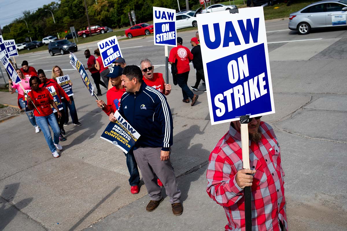 UAW workers striking against Ford, GM, and Stellantis for better pay among record high profits
