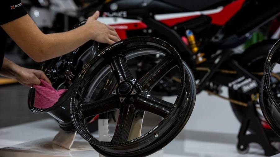A carbon fiber Motorcycle wheel being polished at the 76th EICMA in Milan, Italy
