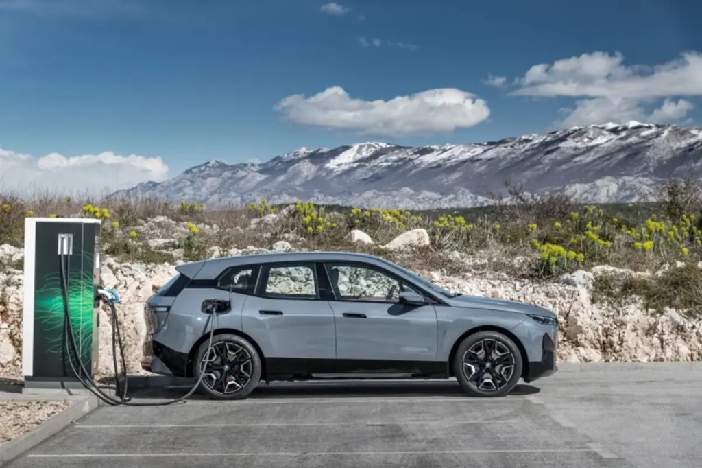 2024 BMW iX EV SUV at charging station