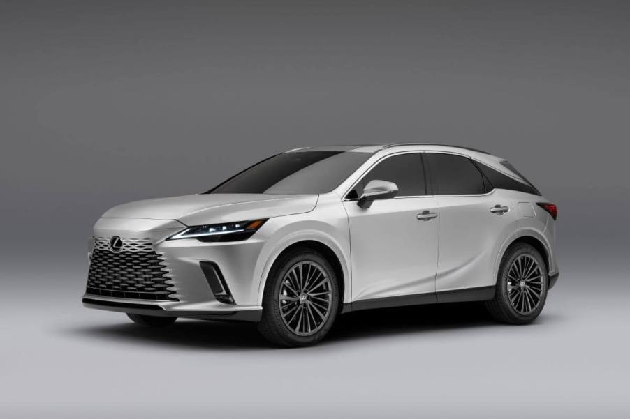 A promotional shot of a 2024 Lexus RX 350 Premium trim midsize luxury SUV model against a gray background