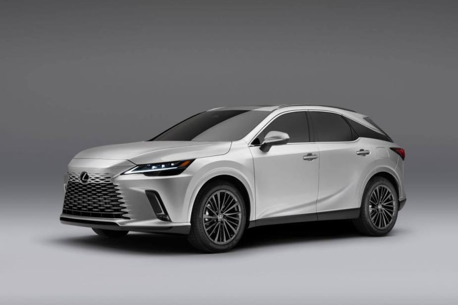 A promotional shot of a 2024 Lexus RX 350 Premium trim midsize luxury SUV model against a gray background