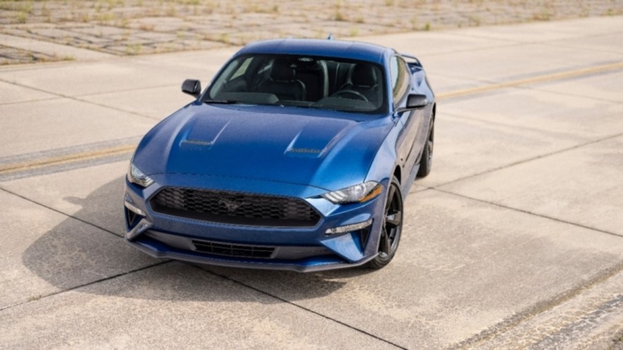 Blue 2023 Ford Mustang on pavement