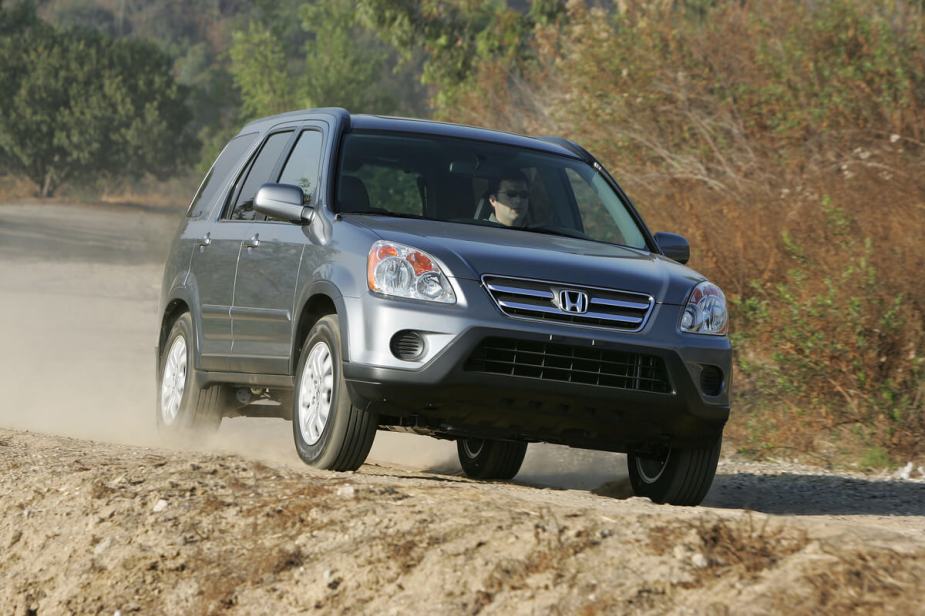 2006 Honda CR-V driving on a dirt road