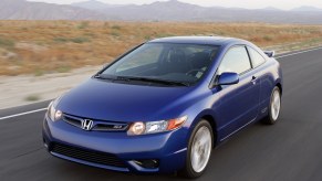 A front view of a blue 2007 Honda Civic Si