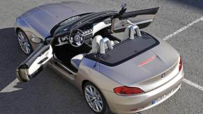 A gold 2009 BMW Z4 Convertible roadster shows off its drop top and interior.