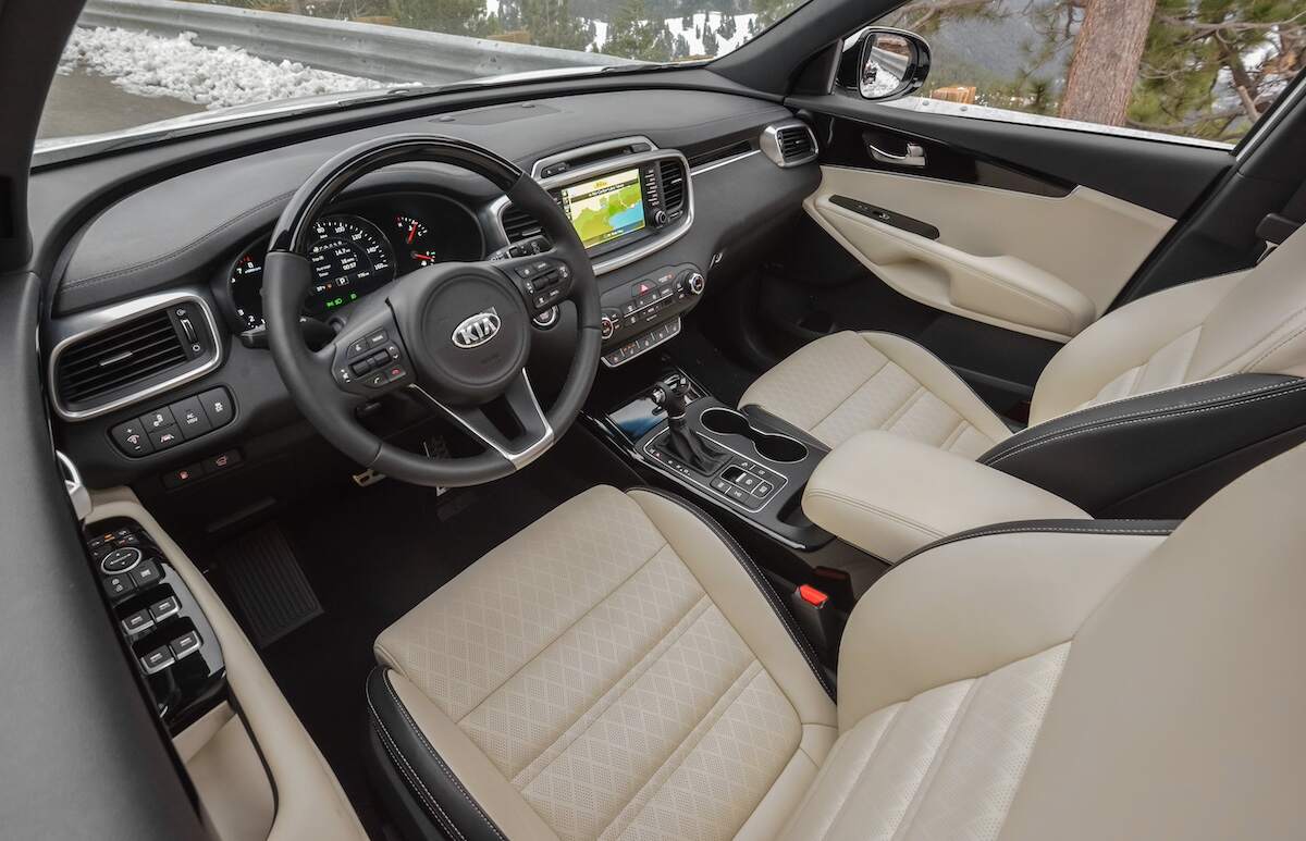 2017 Kia Sorento interior: front seats, steering wheel, and dashboard