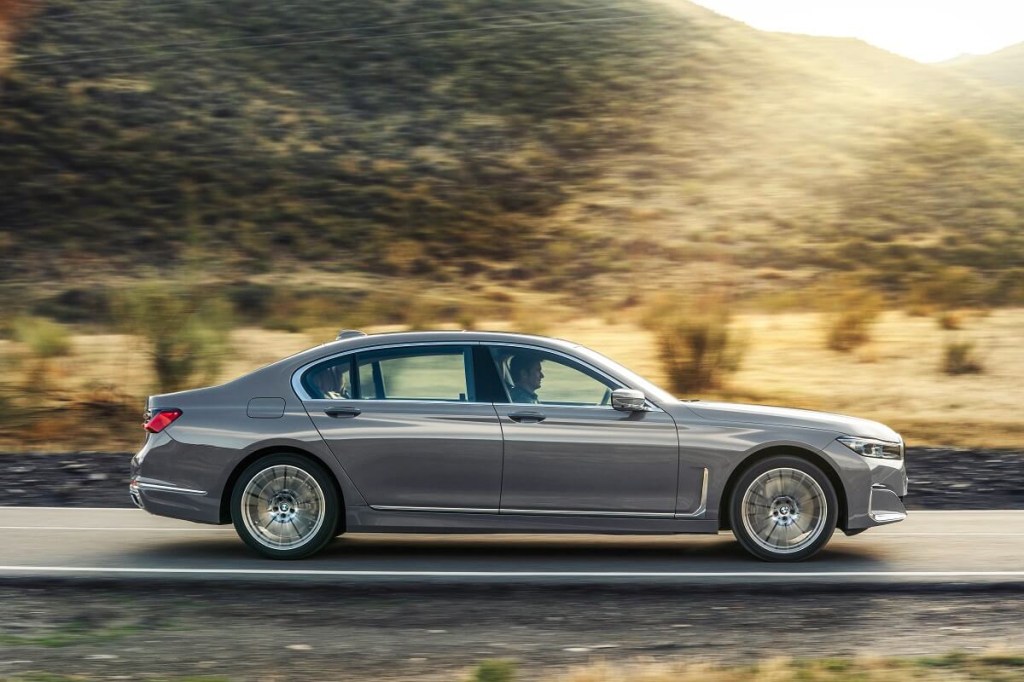 A 2020 BMW 7 Series 740i shows off its significant length on a road. 