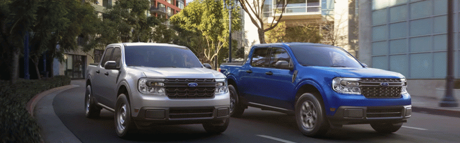 Two 2022 Ford Maverick models driving in the city