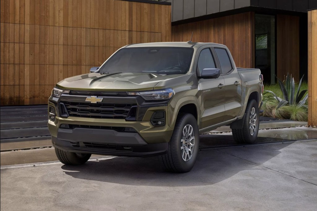 The 2023 Chevy Colorado parked near a home
