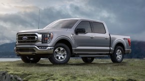 The 2023 Ford F-150 Hybrid parked in the grass