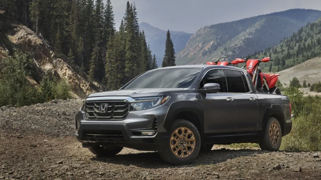 The 2023 Honda Ridgeline off-roading with cargo in the bed