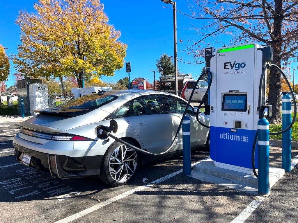 The 2023 Hyundai Ioniq 6 plugged into the fast charger.