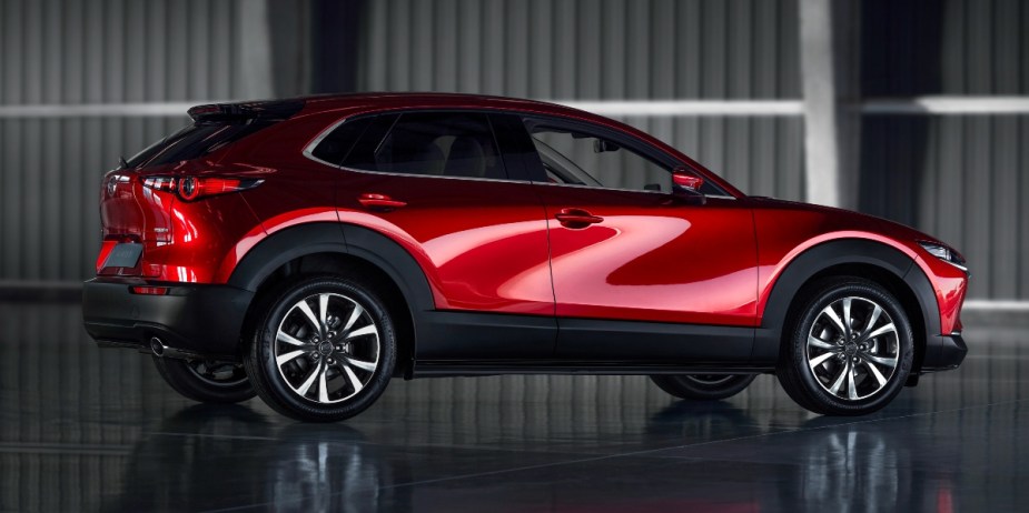 The side view of a 2023 Mazda CX-30 with standard all-wheel drive.