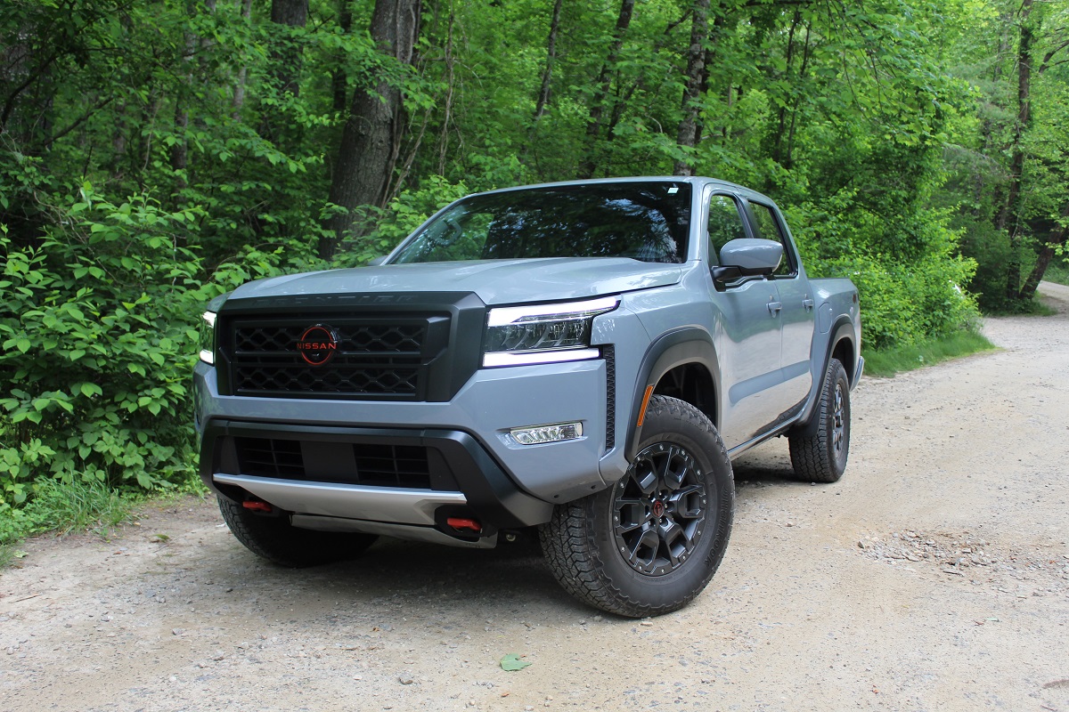 The 2023 Nissan Frontier Pro-4X on a gravel road