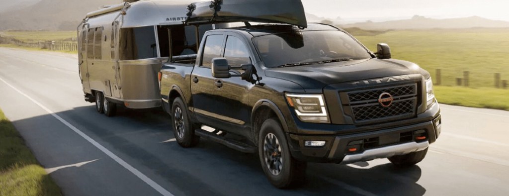 The 2023 Nissan Titan towing a camper