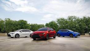 A lineup of 2023 Toyota car models shows off the sedan and hatchback Toyota Corolla models.