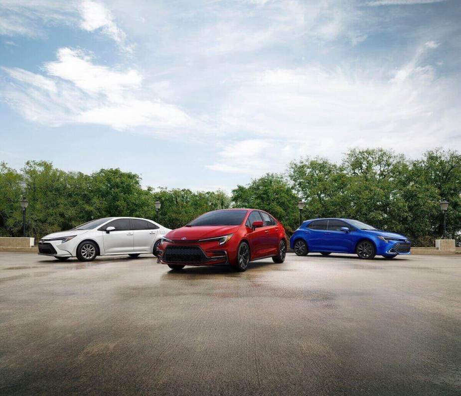 A lineup of 2023 Toyota car models shows off the sedan and hatchback Toyota Corolla models.