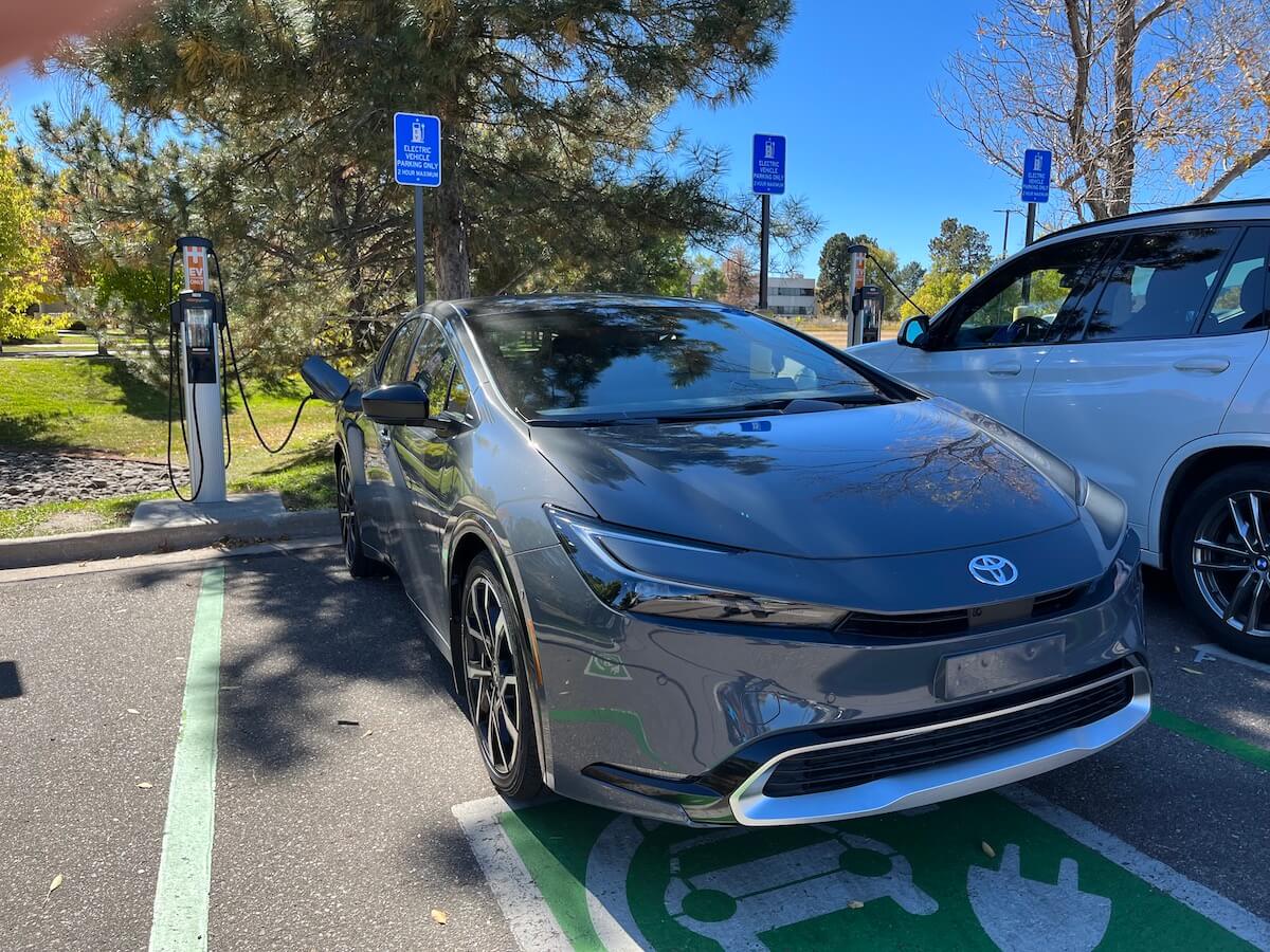 The 2023 Toyota Prius Prime plugged into a charger