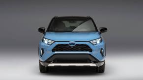 A promotional image of a front-facing 2023 Toyota RAV4 XSE compact SUV model exterior