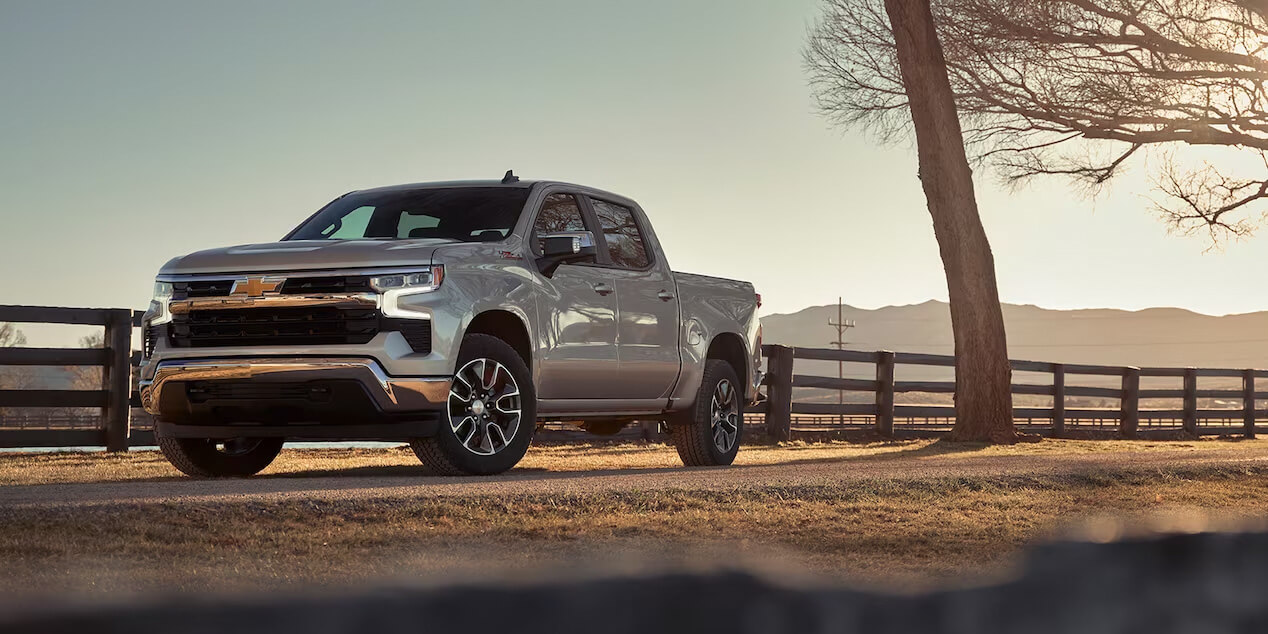 The 2023 Chevy Silverado 1500 Duramax diesel on a country road