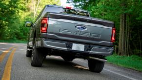 The backside of the 2023 Ford F-150 on the road