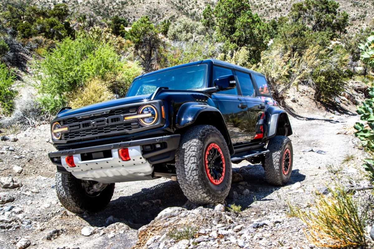 A 2024 Ford Bronco driving off-road.