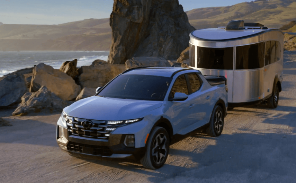 The 2024 Hyundai Santa Cruz towing a trailer 