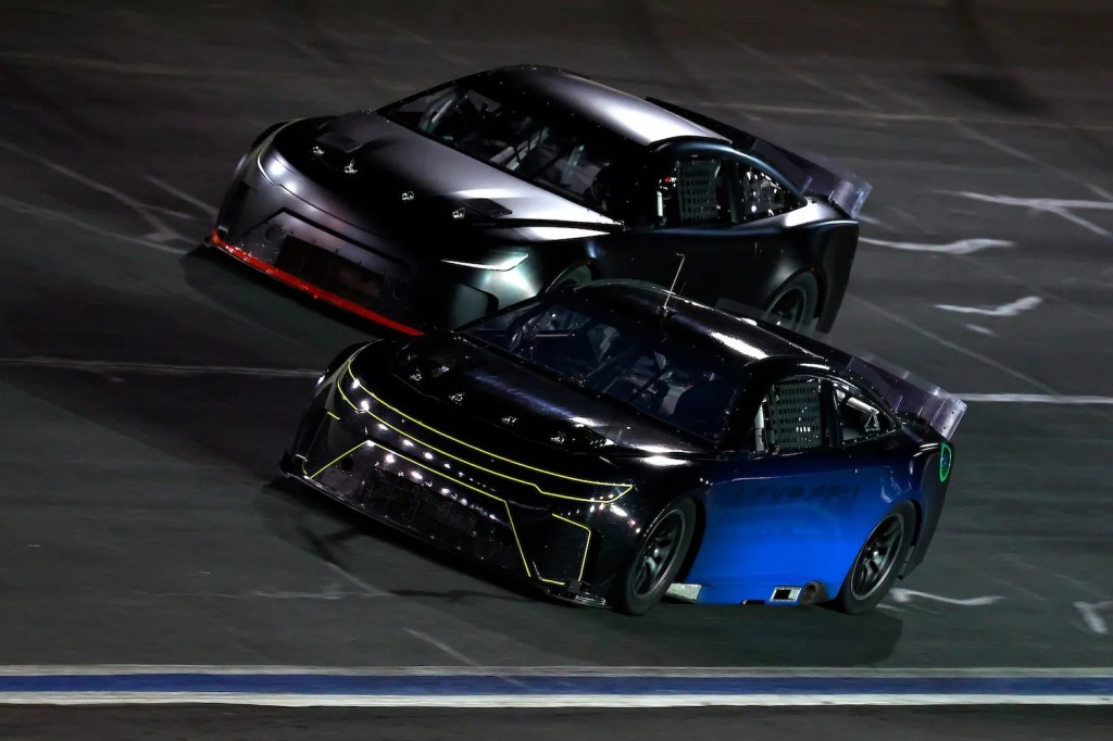 Dodge Charger prototype racing a Next Gen car ahead of the OEM's return to NASCAR.