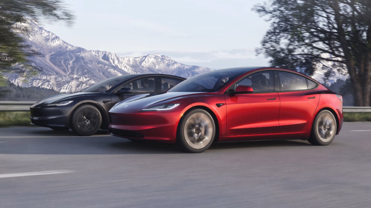 A red and gray set of 2024 Tesla Model 3 Highland EVs cruise together.
