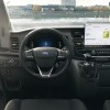 The dash view of the 2024 Ford Transit steering wheel.