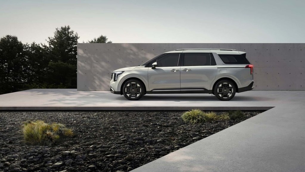2025 Kia Carnival minivan with wall in background