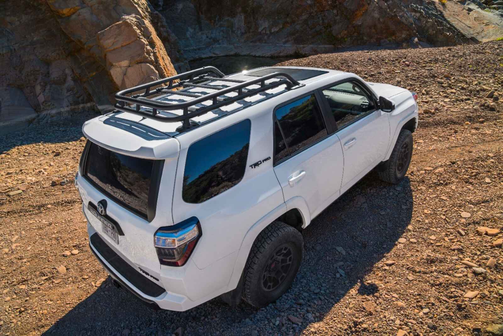 2024 Toyota 4Runner TRD Pro with a roof rack in Ice Cap White paint color