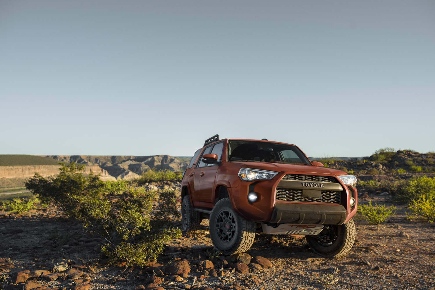 The 2024 Toyota 4Runner driving off-road.