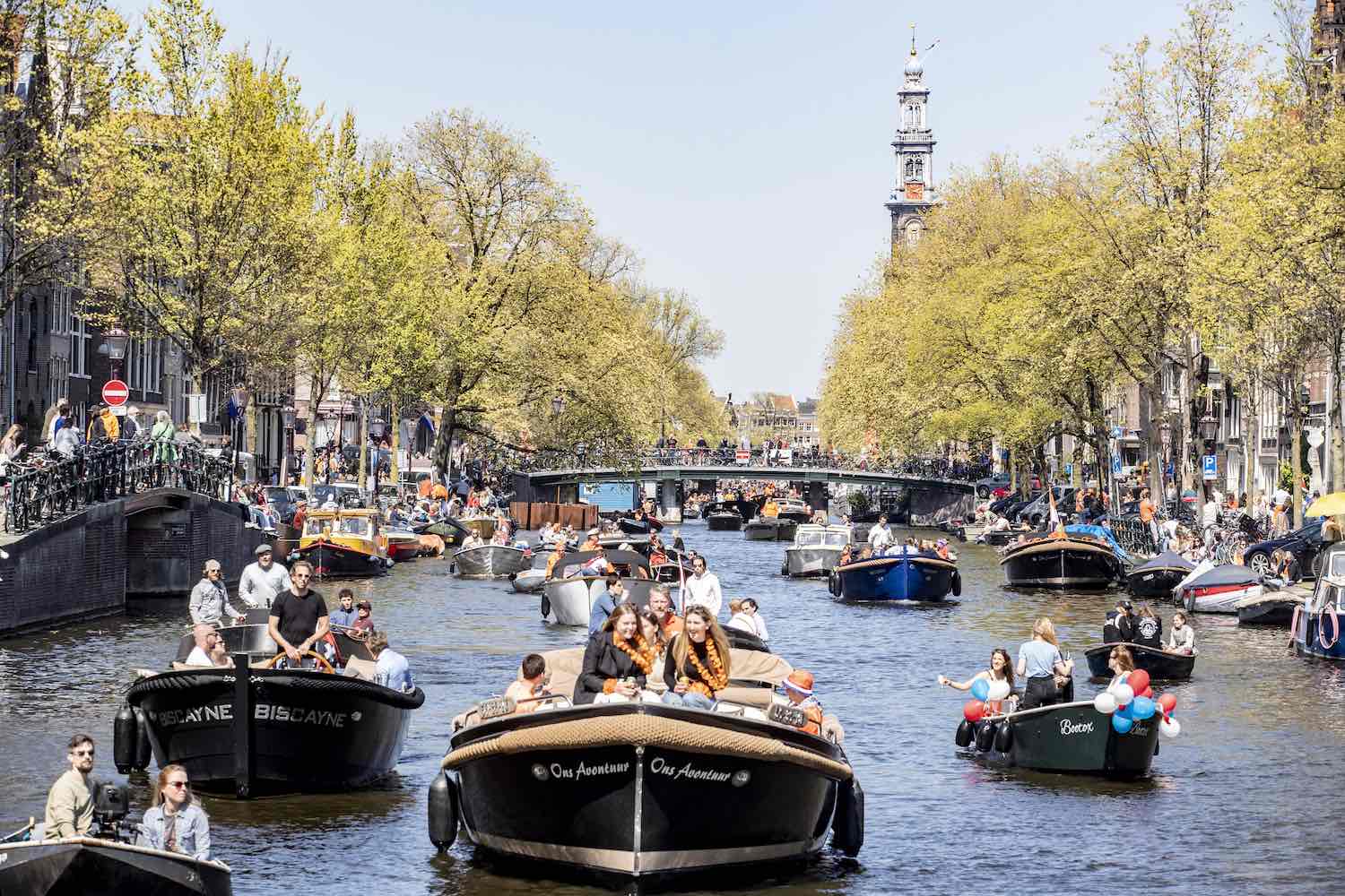The annual "King's Day" boat parade through the canals of Amsterdam in the Netherlands.