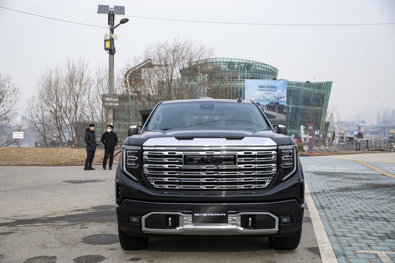 A black GMC Sierra Denali parked in front of the venue for GM Korea Co.'s launch event in Seoul. The GMC Sierra Elevation is a good bargain buy.