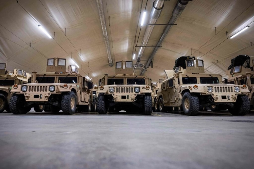 A row of USMC Humvee tactical vehicles, the military version of the Hummer H1, await service in Norway.