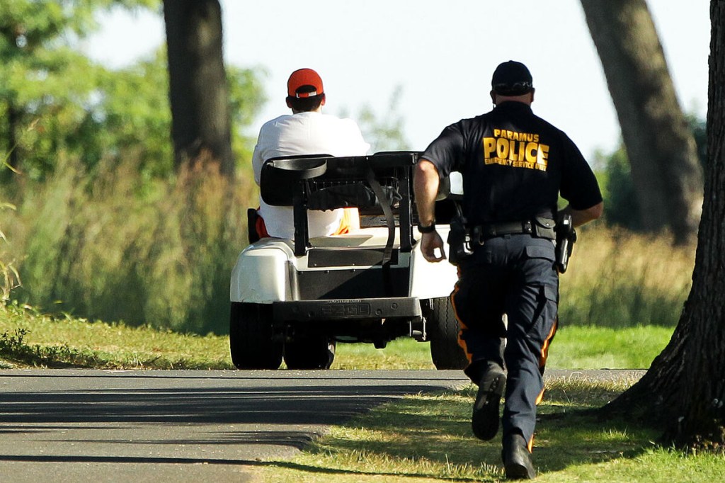 Police chase golf cart rear view